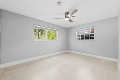 TOTALLY REMODELED 3/2 WITH 1 CAR GARAGE LOCATED RIGHT ACROSS THE on Eco Golf Club in Florida - for sale on GolfHomes.com, golf home, golf lot