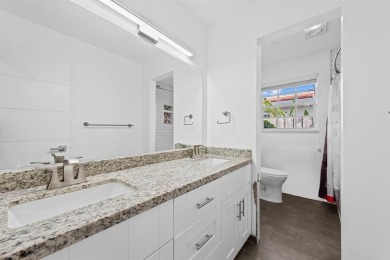 TOTALLY REMODELED 3/2 WITH 1 CAR GARAGE LOCATED RIGHT ACROSS THE on Eco Golf Club in Florida - for sale on GolfHomes.com, golf home, golf lot