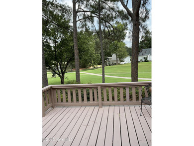 Welcome to this charming split-level home situated on the 18th on Wilson Country Club in North Carolina - for sale on GolfHomes.com, golf home, golf lot