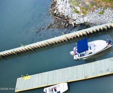 Introducing The Channel, a stunning new home by Logan Homes in on Ocean Ridge Plantation in North Carolina - for sale on GolfHomes.com, golf home, golf lot