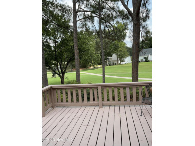 Welcome to a two story, roomy home with a lot of cozy living on Wilson Country Club in North Carolina - for sale on GolfHomes.com, golf home, golf lot