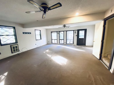 This lovely home on the 13th hole of the Indian Hills golf on Indian Hills Country Club in Arkansas - for sale on GolfHomes.com, golf home, golf lot