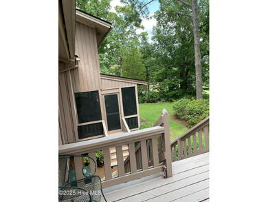 Welcome to this charming split-level home situated on the 18th on Wilson Country Club in North Carolina - for sale on GolfHomes.com, golf home, golf lot