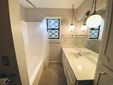 This lovely home on the 13th hole of the Indian Hills golf on Indian Hills Country Club in Arkansas - for sale on GolfHomes.com, golf home, golf lot