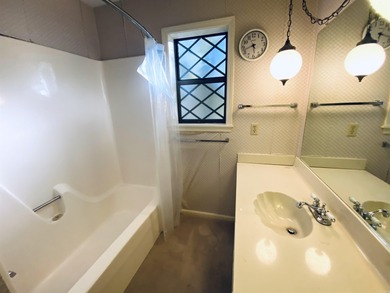 This lovely home on the 13th hole of the Indian Hills golf on Indian Hills Country Club in Arkansas - for sale on GolfHomes.com, golf home, golf lot