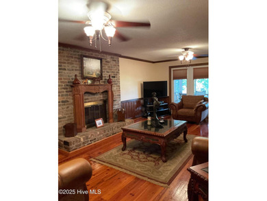 Welcome to this charming split-level home situated on the 18th on Wilson Country Club in North Carolina - for sale on GolfHomes.com, golf home, golf lot