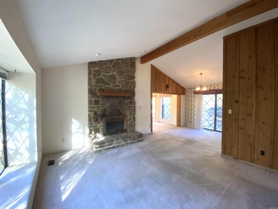 This lovely home on the 13th hole of the Indian Hills golf on Indian Hills Country Club in Arkansas - for sale on GolfHomes.com, golf home, golf lot