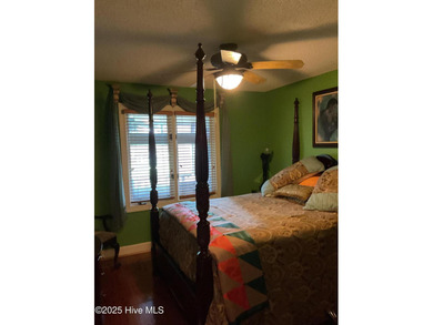 Welcome to this charming split-level home situated on the 18th on Wilson Country Club in North Carolina - for sale on GolfHomes.com, golf home, golf lot