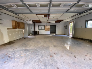 This lovely home on the 13th hole of the Indian Hills golf on Indian Hills Country Club in Arkansas - for sale on GolfHomes.com, golf home, golf lot