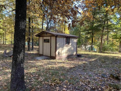 This lovely home on the 13th hole of the Indian Hills golf on Indian Hills Country Club in Arkansas - for sale on GolfHomes.com, golf home, golf lot