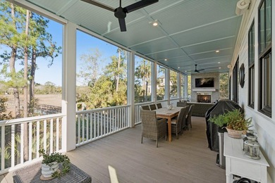 Completed in 2022, this custom creek and marsh front residence on Charleston National Golf Club in South Carolina - for sale on GolfHomes.com, golf home, golf lot