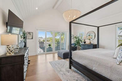 Completed in 2022, this custom creek and marsh front residence on Charleston National Golf Club in South Carolina - for sale on GolfHomes.com, golf home, golf lot