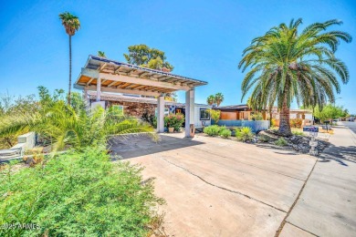 Picture warm summer nights lounging by your pool and a golf on Villa De Paz Golf Course in Arizona - for sale on GolfHomes.com, golf home, golf lot