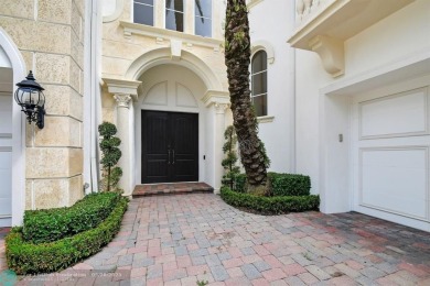 Located In The Heart Of Boca Raton, This Three-story Estate In on Polo Club of Boca Raton in Florida - for sale on GolfHomes.com, golf home, golf lot