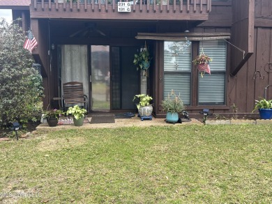 Welcome to your dream villa nestled in the vibrant heart of on Diamondhead Country Club in Mississippi - for sale on GolfHomes.com, golf home, golf lot