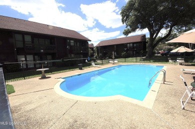 Welcome to your dream villa nestled in the vibrant heart of on Diamondhead Country Club in Mississippi - for sale on GolfHomes.com, golf home, golf lot
