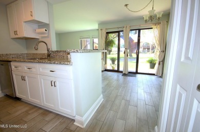 Welcome to your dream villa nestled in the vibrant heart of on Diamondhead Country Club in Mississippi - for sale on GolfHomes.com, golf home, golf lot