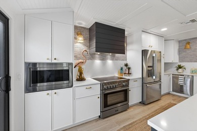 Stunning fully renovated single-family home in coveted on  in Florida - for sale on GolfHomes.com, golf home, golf lot