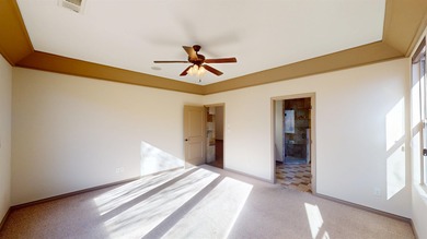 Lock-and-leave living - Colorado National Monument views - Near on Tiara Rado Golf Course in Colorado - for sale on GolfHomes.com, golf home, golf lot