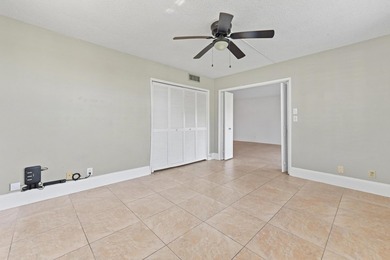 Beautiful & spacious 3/2 corner ground-floor unit (1,390 SF) on  in Florida - for sale on GolfHomes.com, golf home, golf lot