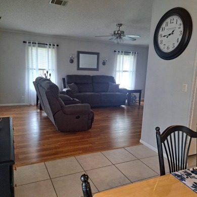 Located in a very active gated 55+ community with easy access to on Zephyrhills Municipal Golf Course in Florida - for sale on GolfHomes.com, golf home, golf lot