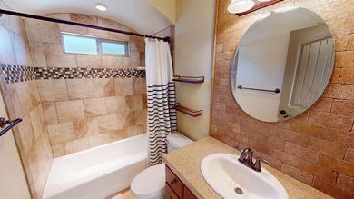 Lock-and-leave living - Colorado National Monument views - Near on Tiara Rado Golf Course in Colorado - for sale on GolfHomes.com, golf home, golf lot