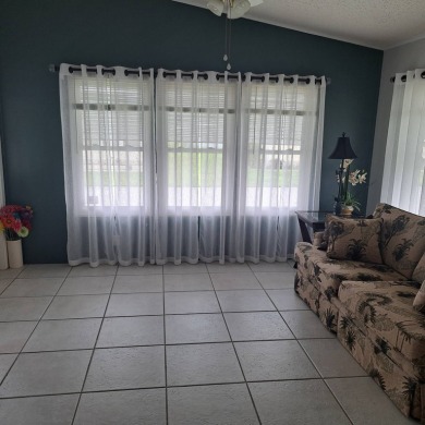 Located in a very active gated 55+ community with easy access to on Zephyrhills Municipal Golf Course in Florida - for sale on GolfHomes.com, golf home, golf lot