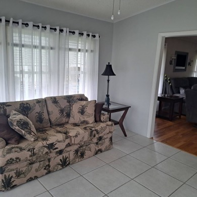 Located in a very active gated 55+ community with easy access to on Zephyrhills Municipal Golf Course in Florida - for sale on GolfHomes.com, golf home, golf lot