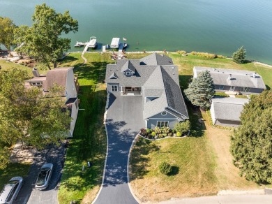 Discover your lakeside paradise in this exquisite waterfront on Lake Carroll Golf Course in Illinois - for sale on GolfHomes.com, golf home, golf lot