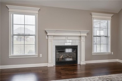 WELCOME TO CHAMPIONS POINTE and this QUALITY-BUILT, ONE-LEVEL on Champions Pointe Golf Course in Indiana - for sale on GolfHomes.com, golf home, golf lot