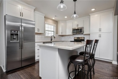 WELCOME TO CHAMPIONS POINTE and this QUALITY-BUILT, ONE-LEVEL on Champions Pointe Golf Course in Indiana - for sale on GolfHomes.com, golf home, golf lot