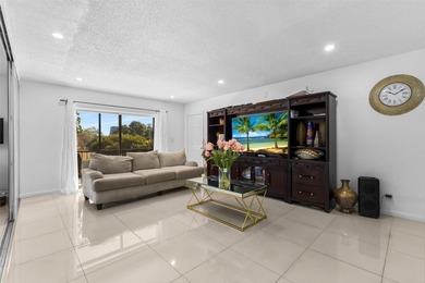 Bright 3/2 corner condo offering golf course living in Inverrary on Inverrary Country Club in Florida - for sale on GolfHomes.com, golf home, golf lot