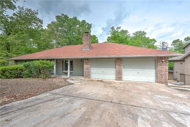Discover a blend of nature and comfort in this 2 level home on Bella Vista Country Club - Berksdale in Arkansas - for sale on GolfHomes.com, golf home, golf lot