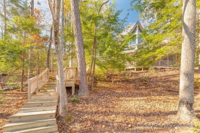Loaded with rustic charm, this mountain retreat is one of the on Rumbling Bald Resort on Lake Lure in North Carolina - for sale on GolfHomes.com, golf home, golf lot