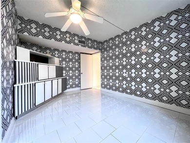 Welcome to this spacious and well-maintained 3-bedroom, 2.5-bath on Palm-Aire Country Club and Resort - The Oaks in Florida - for sale on GolfHomes.com, golf home, golf lot