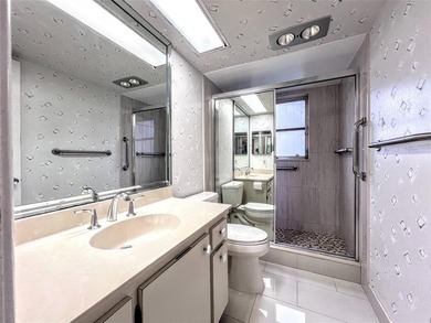 Welcome to this spacious and well-maintained 3-bedroom, 2.5-bath on Palm-Aire Country Club and Resort - The Oaks in Florida - for sale on GolfHomes.com, golf home, golf lot