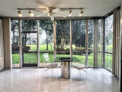 Welcome to this spacious and well-maintained 3-bedroom, 2.5-bath on Palm-Aire Country Club and Resort - The Oaks in Florida - for sale on GolfHomes.com, golf home, golf lot