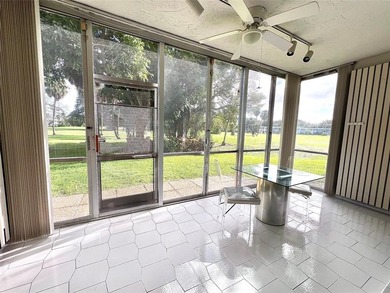 Welcome to this spacious and well-maintained 3-bedroom, 2.5-bath on Palm-Aire Country Club and Resort - The Oaks in Florida - for sale on GolfHomes.com, golf home, golf lot