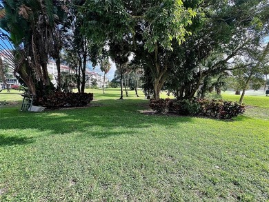 Welcome to this spacious and well-maintained 3-bedroom, 2.5-bath on Palm-Aire Country Club and Resort - The Oaks in Florida - for sale on GolfHomes.com, golf home, golf lot