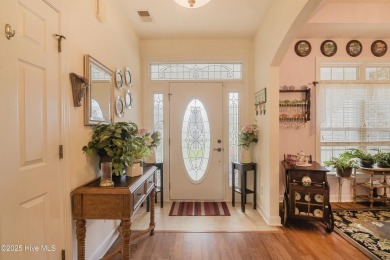 Tucked away on a quiet cul-de-sac in a prestigious gated golf on Brunswick Plantation and Golf Resorts in North Carolina - for sale on GolfHomes.com, golf home, golf lot