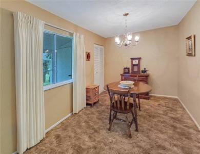 Charming Upstairs Condo with Golf Course  Greenway Views in Live on Country Club At Silver Springs Shores in Florida - for sale on GolfHomes.com, golf home, golf lot