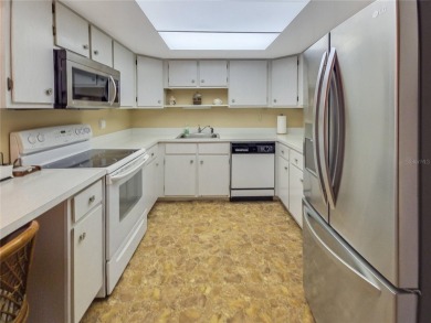 Charming Upstairs Condo with Golf Course  Greenway Views in Live on Country Club At Silver Springs Shores in Florida - for sale on GolfHomes.com, golf home, golf lot