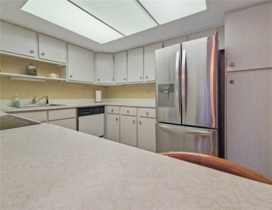 Charming Upstairs Condo with Golf Course  Greenway Views in Live on Country Club At Silver Springs Shores in Florida - for sale on GolfHomes.com, golf home, golf lot
