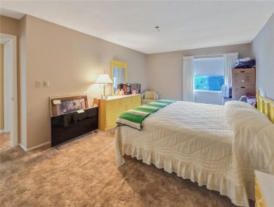 Charming Upstairs Condo with Golf Course  Greenway Views in Live on Country Club At Silver Springs Shores in Florida - for sale on GolfHomes.com, golf home, golf lot