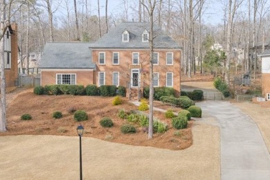 Nestled in the sought after Glastonberry community in Johns on Rivermont Golf and Country Club in Georgia - for sale on GolfHomes.com, golf home, golf lot