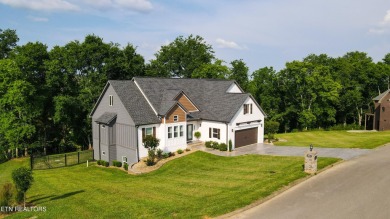 Over 4,000 square feet, 5 bedroom, 3.5 bath basement rancher in on River Islands Golf Club in Tennessee - for sale on GolfHomes.com, golf home, golf lot