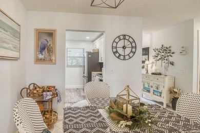 Enjoy the best of South Florida living in this beautifully on  in Florida - for sale on GolfHomes.com, golf home, golf lot