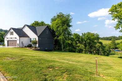 Over 4,000 square feet, 5 bedroom, 3.5 bath basement rancher in on River Islands Golf Club in Tennessee - for sale on GolfHomes.com, golf home, golf lot