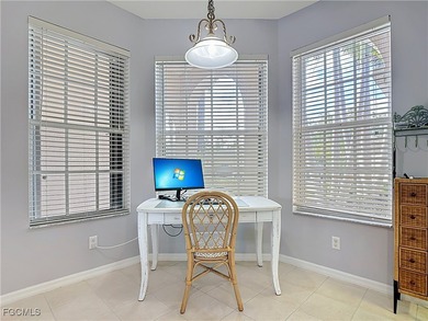 Expanded IBIS II pool home with serene lake and fountain views on Herons Glen Golf and Country Club in Florida - for sale on GolfHomes.com, golf home, golf lot