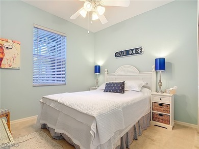 Expanded IBIS II pool home with serene lake and fountain views on Herons Glen Golf and Country Club in Florida - for sale on GolfHomes.com, golf home, golf lot